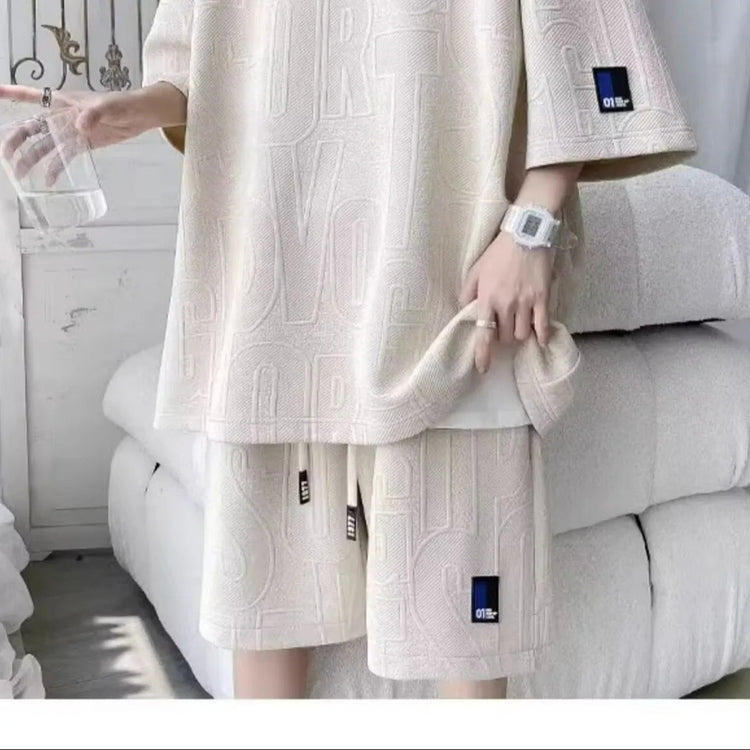Abito di moda maschile bello set con pantaloncini a maniche corte jacquard sportivi casual larghi Set da due pezzi 2025 Primavera ed estate platinumshop