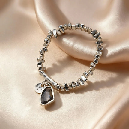 Set di bracciali con collana con pendente in cristallo grigio irregolare semplice barocco Set di gioielli con perline color argento estetico delicato per donna uomo platinumshop