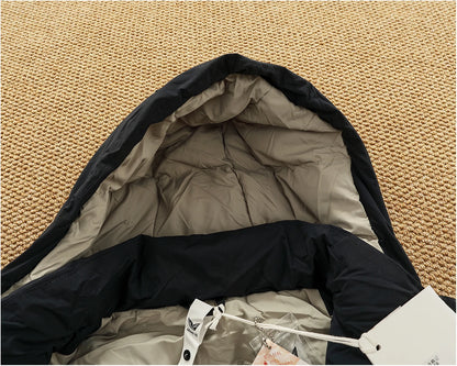 Piumino cargo imbottito in piuma d'anatra di media lunghezza retrò americano nuovo inverno con cappuccio Trench oversize spesso alla moda da uomo