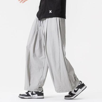 Pantaloni Harem Oversize da Uomo Leggeri Sottili Traspiranti Tinta Unita Stile Harajuku Gamba Larga Casual Moda Pantaloni Dritti Uomo 5XL