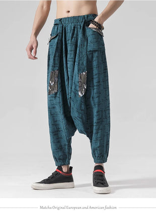 Pantaloni a gamba larga da uomo in cotone e lino casual oversize Harajuku pantaloni alla moda da uomo samurai giapponese retrò Ukiyo-e stampa pantaloni con cintura da uomo