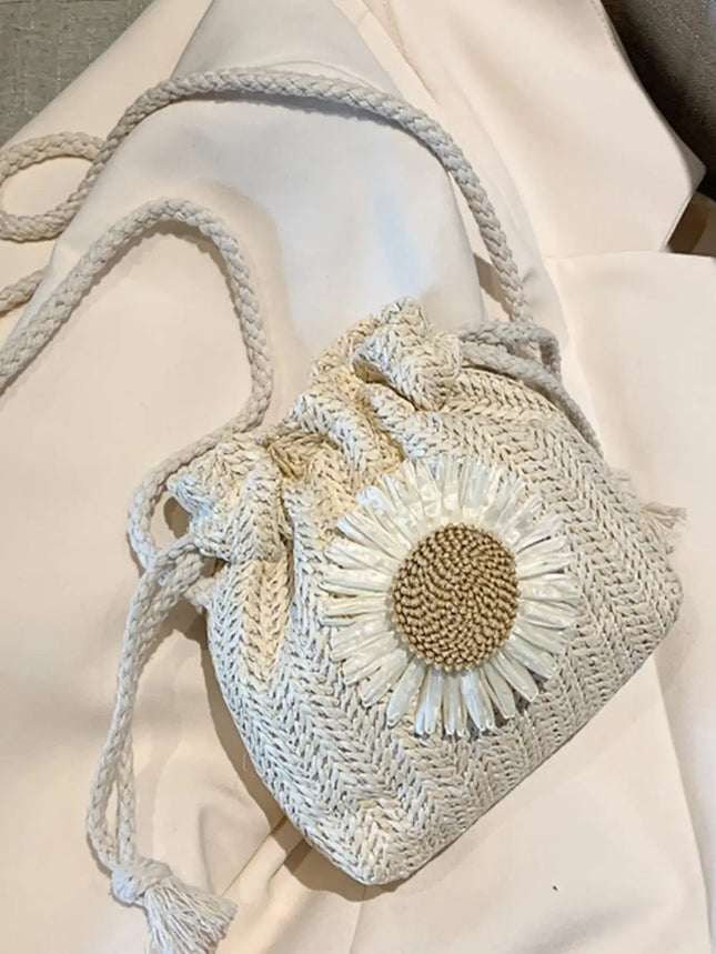 Lightweight woven straw drawstring bucket bag, with a sunflower pattern, ideal for beach holidays, for girls.