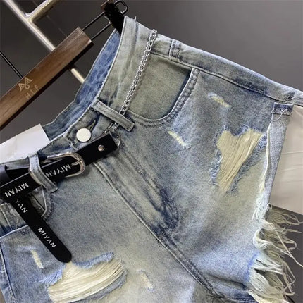 New style ripped denim shorts with frayed washed pockets and wide legs