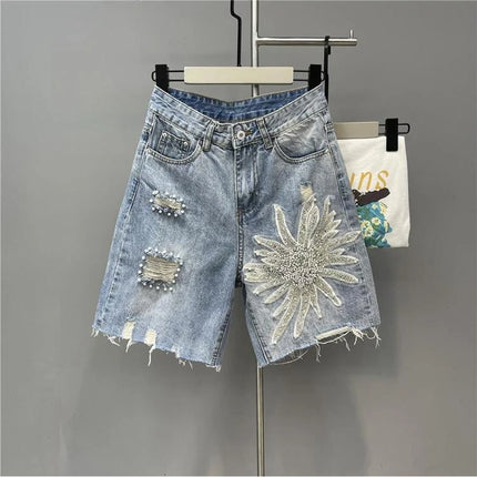 Pantaloncini di jeans con foro sfilacciato floreale con perline alla moda Pantaloncini casual estivi da donna a vita alta in tinta unita stile coreano