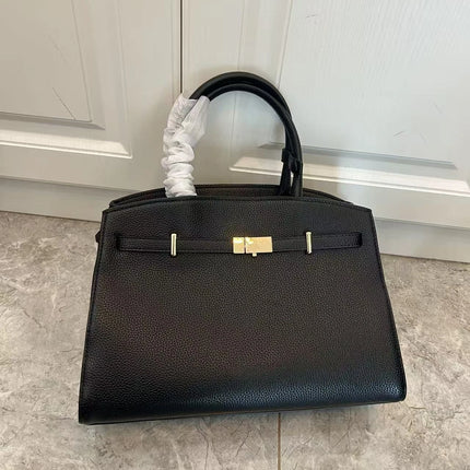 Borsa a mano di lusso in pelle martellata con chiusura in metallo, manico rigido, borsa professionale per affari e cerimonie