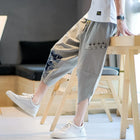 Pantaloni Kimono giapponesi da uomo in cotone traspirante Samurai Abbigliamento Pantaloni da uomo Stampa allentata Pantaloncini Harem retrò Pantaloni Hip Hop Harajuku