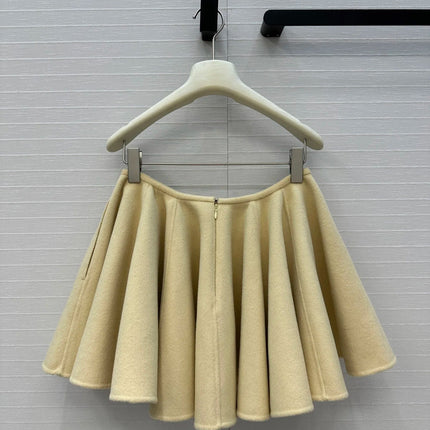 A light yellow high-waisted short skirt with ruffled edges and a double-sided wool A-line skirt, looking cute and playful PlatiNum