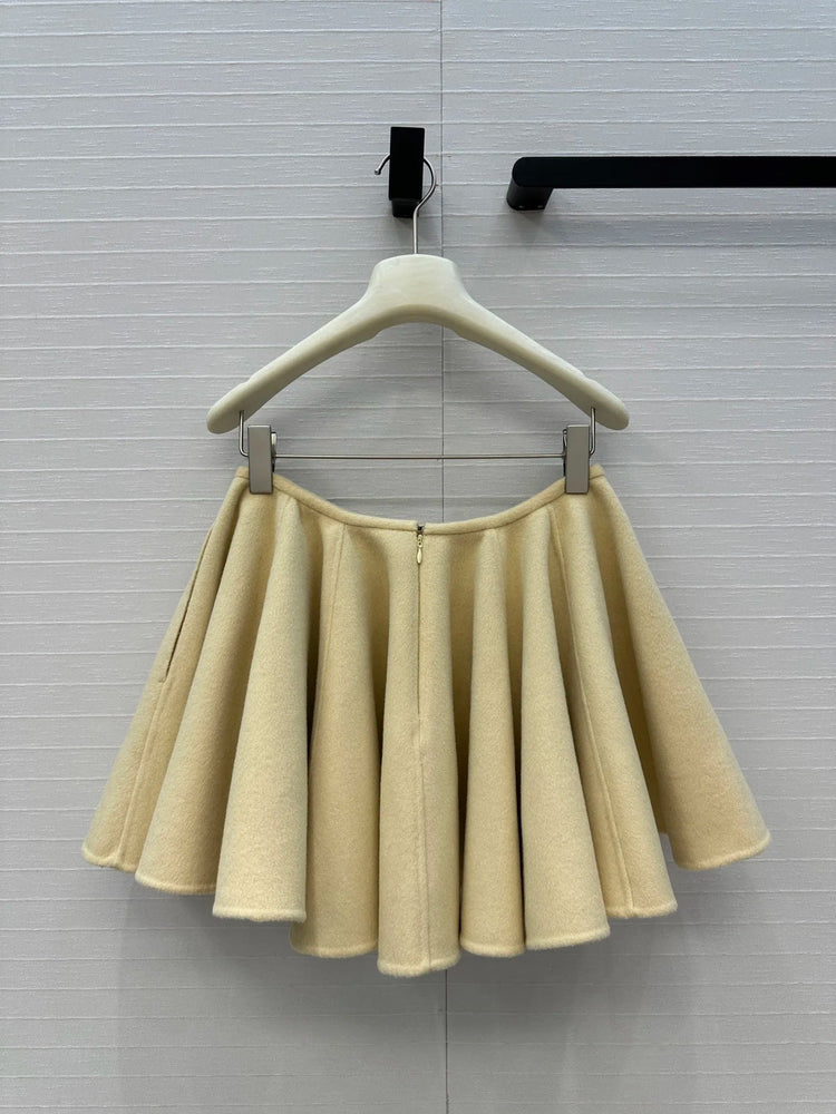 A light yellow high-waisted short skirt with ruffled edges and a double-sided wool A-line skirt, looking cute and playful PlatiNum