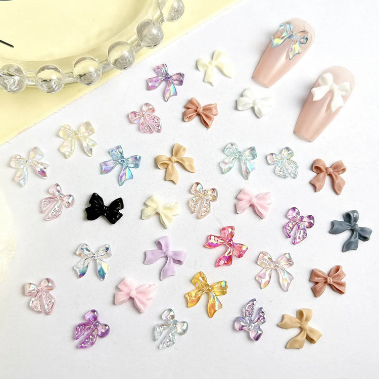 50pcs 3D Sweet Pearly Glossy Ribbon Bow Resin Nail Charms Ballerina Bow Tie Nail Art Decoration Nail Accessories Manicure DIY