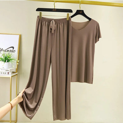 Completo due pezzi da donna: top e pantaloni. Set estivo due pezzi, abiti da donna per vacanze, nuova collezione 2026, pantaloni a gamba larga, eleganti e casual. platinumshop