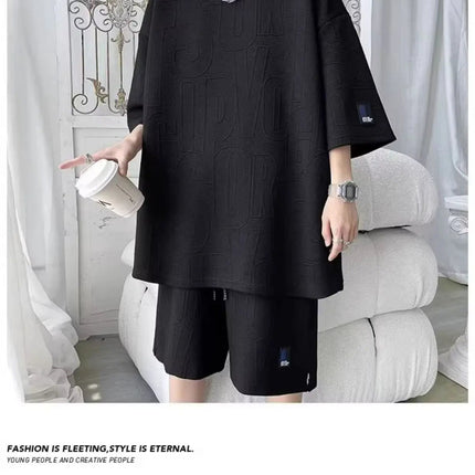 Abito di moda maschile bello set con pantaloncini a maniche corte jacquard sportivi casual larghi Set da due pezzi 2025 Primavera ed estate platinumshop