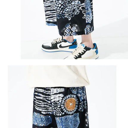 Pantaloncini da uomo estivi Stampa Pantaloni da spiaggia traspiranti a gamba larga Pantaloni larghi casual alla moda Vita elastica Comodi pantaloni al polpaccio da uomo