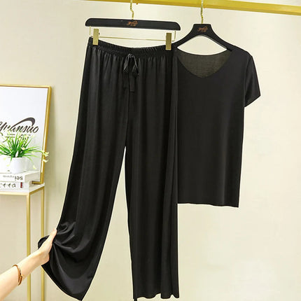 Completo due pezzi da donna: top e pantaloni. Set estivo due pezzi, abiti da donna per vacanze, nuova collezione 2026, pantaloni a gamba larga, eleganti e casual. platinumshop