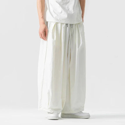 Pantaloni cargo da uomo Pantaloni casual stile giapponese Harajuku Moda allentata maschile Harem Pantaloni a gamba larga in vita elastica Uomo Nuovo streetwear