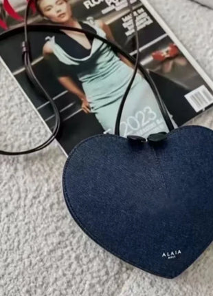 Borsa a tracolla da donna alla moda, a forma di cuore, in vera pelle, morbida e liscia, leggera, casual, per esterni, con scomparti interni.
