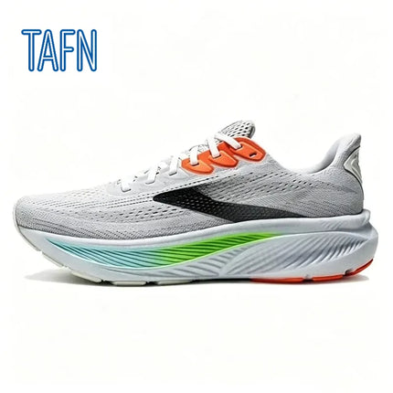 Scarpe da corsa professionali in tessuto jacquard ultra-traspirante, con suola ondulata ad alta reattività per allenamento maratona e corsa a lunga distanza intensiva.