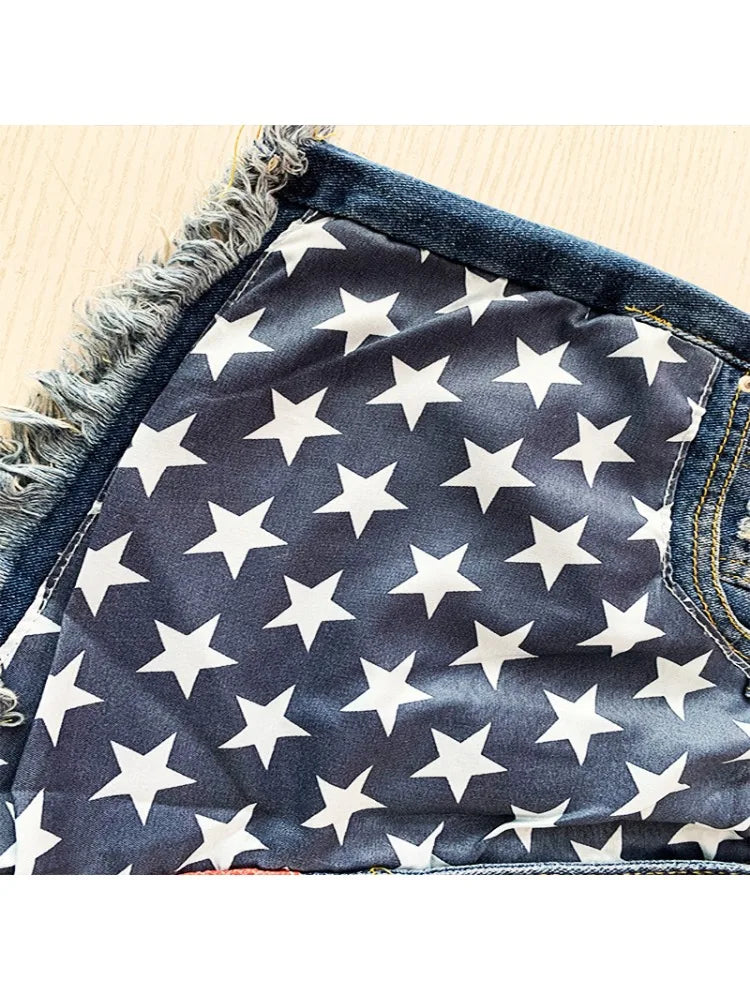 Pantaloncini di jeans con stampa stelle e nappe con bandiera americana estiva da donna Pantaloncini di design con nappe alla moda Pantaloncini casual versatili