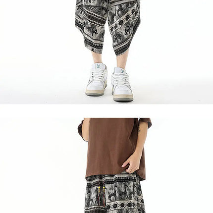 Pantaloncini estivi con stampa da spiaggia, pantaloni casual leggeri e traspiranti, pantaloni larghi alla moda da uomo, pantaloni comodi a lunghezza polpaccio per uomo