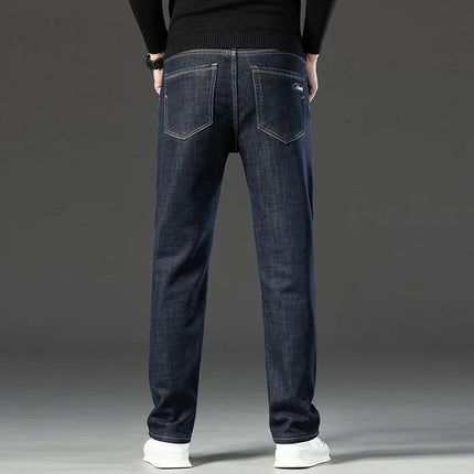 2026 Winter Thermal Stretch Jeans Men New Loose Straight Leg Casual Trousers Male Daily Commute Windproof Denim Pants
