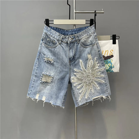 Pantaloncini di jeans con foro sfilacciato floreale con perline alla moda Pantaloncini casual estivi da donna a vita alta in tinta unita stile coreano
