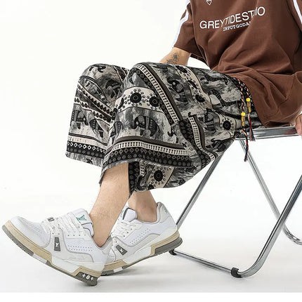 Pantaloncini estivi con stampa da spiaggia, pantaloni casual leggeri e traspiranti, pantaloni larghi alla moda da uomo, pantaloni comodi a lunghezza polpaccio per uomo