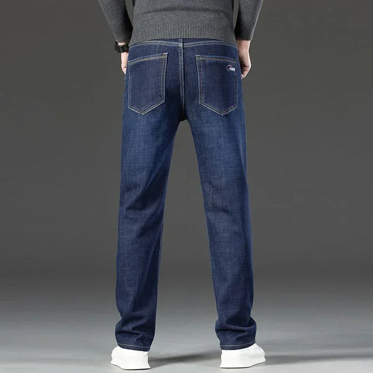 2026 Winter Thermal Stretch Jeans Men New Loose Straight Leg Casual Trousers Male Daily Commute Windproof Denim Pants