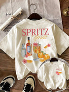 Top girocollo con stampa di cocktail e lettere dei cartoni animati Top casual estivo a maniche corte da donna in stile semplice e versatile