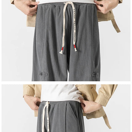 Pantaloni da uomo caldi di vendita autunno stile cinese pantaloni larghi larghi vintage moda uomo pantaloni lanterna con coulisse Harajuku solidi