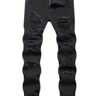 Single piece of trendy streetwear: straight-cut ripped denim jeans in black. PlatiNum