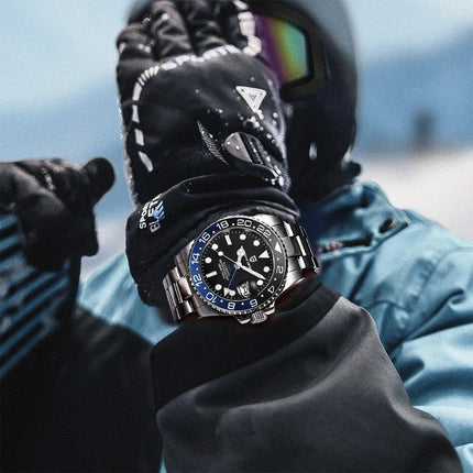 TOP PAGANI DESIGN PD1662 GMT Orologio meccanico automatico da uomo Cinturino in acciaio inossidabile Anello in ceramica blu Quadrante bianco Resistente all'acqua fino a 100 m Orologi da polso sportivi da uomo luminosi per uom
