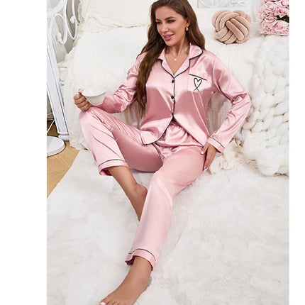 Vestiti per la casa delle donne Pigiama in raso Autunno Tasca a maniche lunghe Ricamo a forma di cuore Top e pantaloni Pigiama Femme Loungewear Pj Set