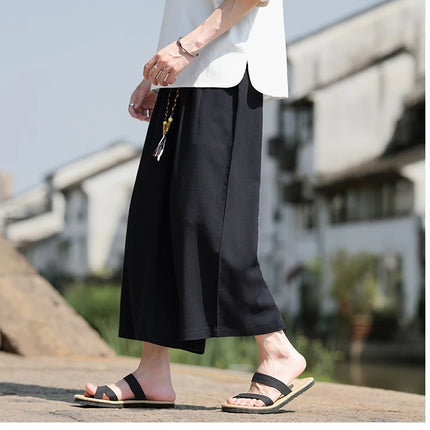 Pantaloncini larghi da uomo Pantaloni casual traspiranti estivi Gamba larga in cotone di lino Taglie forti 5XL Pantaloni Harajuku comodi da esterno da uomo