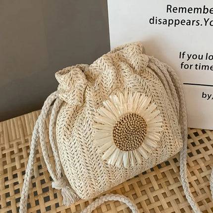 Lightweight woven straw drawstring bucket bag, with a sunflower pattern, ideal for beach holidays, for girls.
