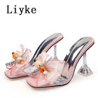 Liyke 2026 Nouvelle Mode 9CM Pantoufles à Talon Transparent Fil Net Rose Nœud Papillon Sandales d'Été Chaussures Transparentes pour Femmes Claquettes Présentations des entreprises productrices de jeux