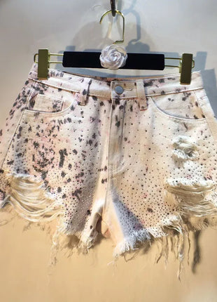 2025 Abiti estivi, Nuovi pantaloncini di jeans con bordo ruvido indossato a vita alta con perforazio