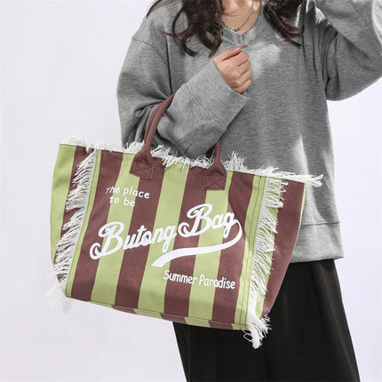 Borsa tote a righe da donna con colori contrastanti Borsa a tracolla con lettere alla moda Borsa da pendolarismo per ascelle di grande capacità