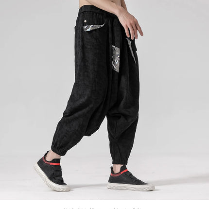 Pantaloni a gamba larga da uomo in cotone e lino casual oversize Harajuku pantaloni alla moda da uomo samurai giapponese retrò Ukiyo-e stampa pantaloni con cintura da uomo