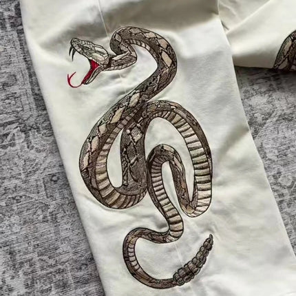 Jeans Streetwear Retrò con Ricamo Boa e Stampa Pitone, Pantaloni in Denim con Tasche, Tendenza Y2K, Unisex, Gamba Dritta e Vestibilità Ampia
