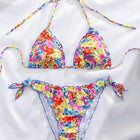 Nuovo Set Bikini Donna Estivo con Stampa Floreale Arancione, Halter con Volant, Push-Up e Perizoma con Laccetti Laterali PlatiNum