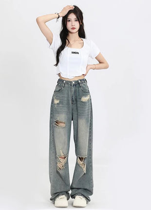 Jeans americani retrò traforati da donna a vita alta con cavallo dritto design sottile allentato High-street Vibe pantaloni trascinanti a gamba larga