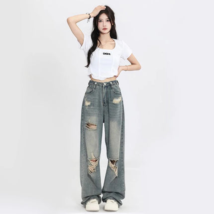 Jeans americani retrò traforati da donna a vita alta con cavallo dritto design sottile allentato High-street Vibe pantaloni trascinanti a gamba larga