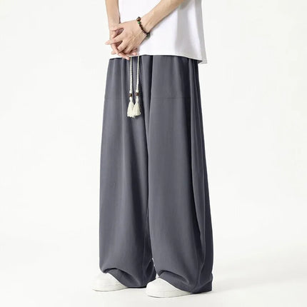 Nuovi pantaloni da uomo Casual comodi pantaloni a gamba larga pantaloni Harun larghi alla moda pantaloni sportivi con coulisse lanterna da uomo taglie forti