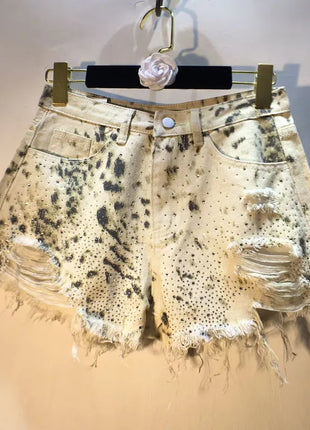 2025 Abiti estivi, Nuovi pantaloncini di jeans con bordo ruvido indossato a vita alta con perforazio