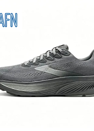 Scarpe da corsa professionali in tessuto jacquard ultra-traspirante, con suola ondulata ad alta reattività per allenamento maratona e corsa a lunga distanza intensiva.