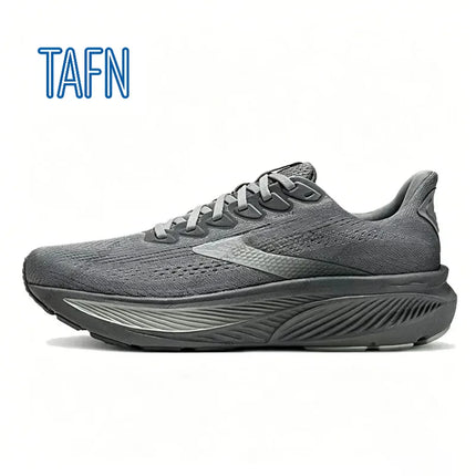 Scarpe da corsa professionali in tessuto jacquard ultra-traspirante, con suola ondulata ad alta reattività per allenamento maratona e corsa a lunga distanza intensiva.