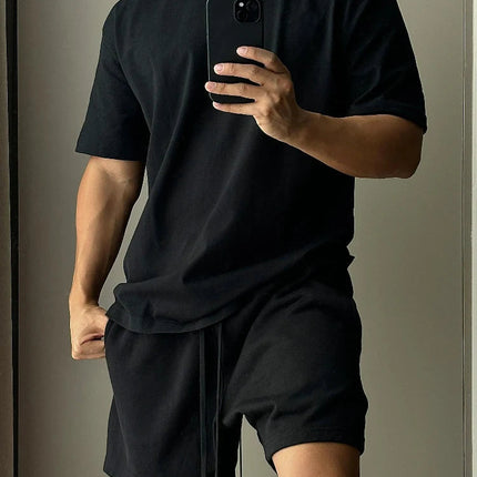 Set di pantaloncini a maniche corte in puro cotone da uomo, t-shirt sportiva e per il tempo libero allentata alla moda europea e americana platinumshop