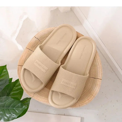 Pantofole da interno per coppia casual Nuovi sandali piatti da donna semplici per il tempo libero all'aperto da uomo Scarpe comode in materiale EVA per la casa