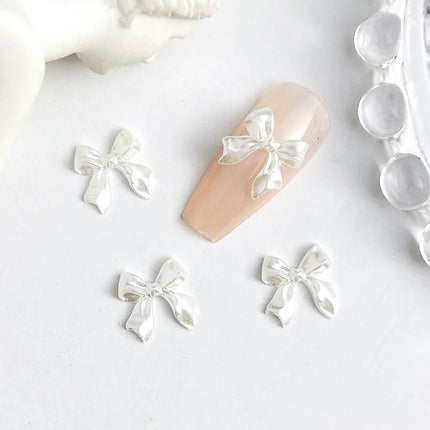 50pcs 3D Sweet Pearly Glossy Ribbon Bow Resin Nail Charms Ballerina Bow Tie Nail Art Decoration Nail Accessories Manicure DIY