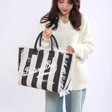 Borsa tote a righe da donna con colori contrastanti Borsa a tracolla con lettere alla moda Borsa da pendolarismo per ascelle di grande capacità