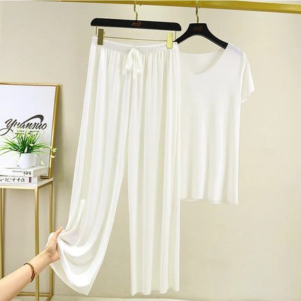 Completo due pezzi da donna: top e pantaloni. Set estivo due pezzi, abiti da donna per vacanze, nuova collezione 2026, pantaloni a gamba larga, eleganti e casual. platinumshop